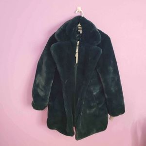 Apparis faux fur coat in green size small